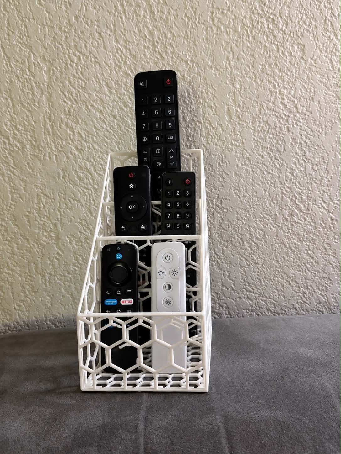 Porte-télécommandes alvéolé à étages